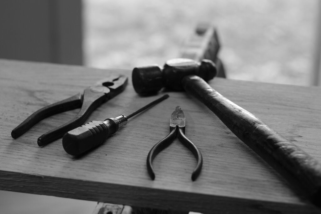 Basic hand tools every homeowner needs — hammer, screwdrivers, tape measure